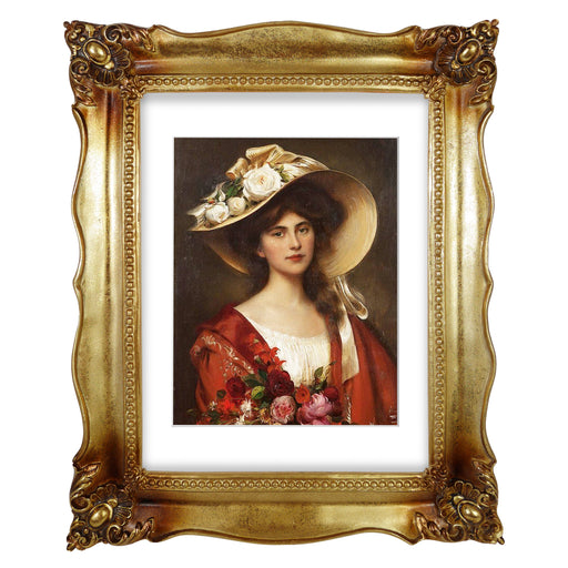 An antique gold picture frame with a white mat, displayed with a picture of a woman in a red dress and a wide-brimmed hat.