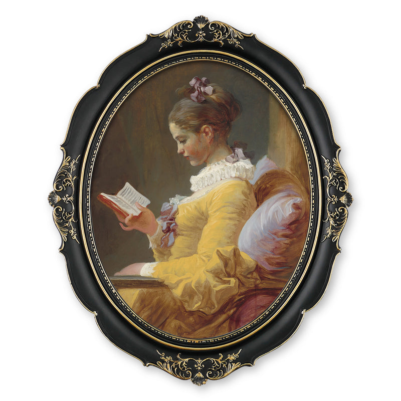 An oval-shaped black picture frame with embossed flourish details. It is designed for both wall and tabletop display.