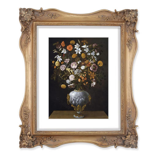 An 8x10 picture frame with floral corner ornaments, designed for tabletop and wall display, made of resin and painted to achieve a vintage look.