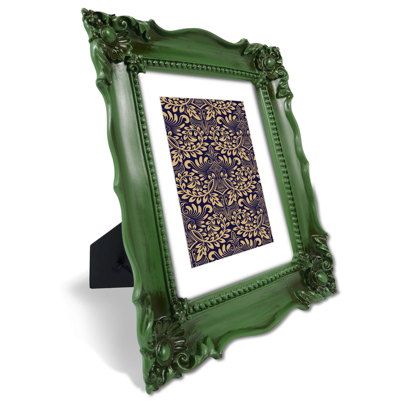 A baroque-style picture frame in dark green color. The frame is designed for wall and tabletop display.