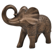 A elephant sculpture standing 6 inches tall, features a rich bronze finish with hand-painted details that highlight its artistry.