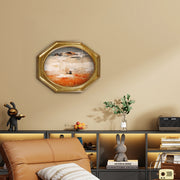 An antique-style octagon picture frame with a brushed gold finish.