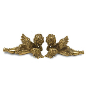 Gold cherub tealight candle holders, perfect for creating a balanced and harmonious display.
