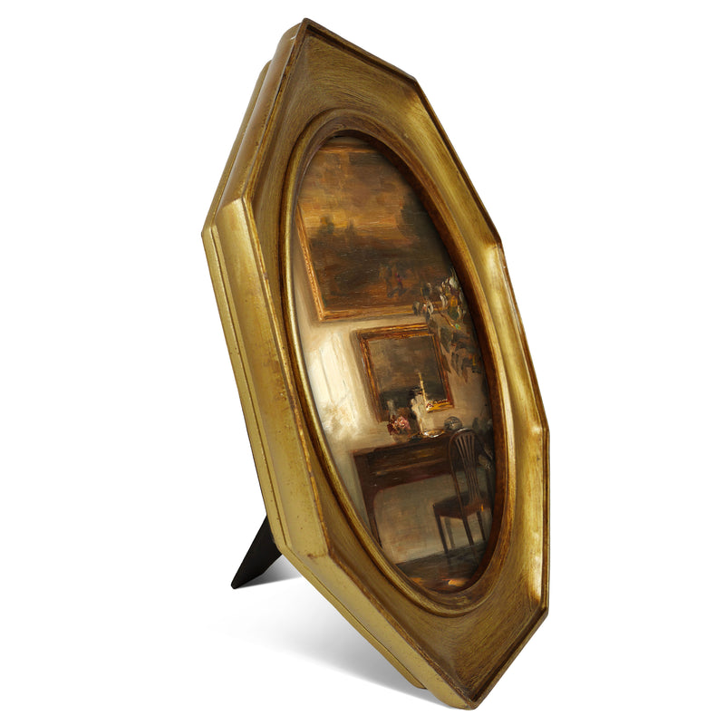 An antique-style octagon picture frame with a brushed gold finish, containing a printed artwork of an MCM style interior.