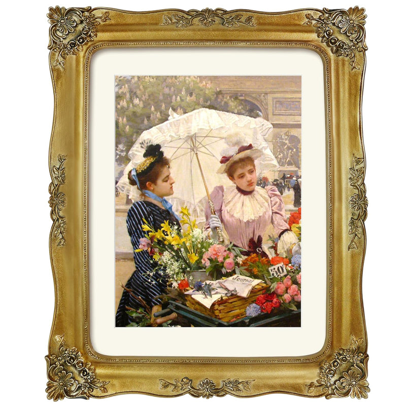 Decorative gold frame with a painting of two women under an umbrella.