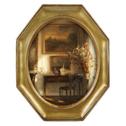 An antique-style octagon picture frame with a brushed gold finish, containing a printed artwork of an MCM style interior.