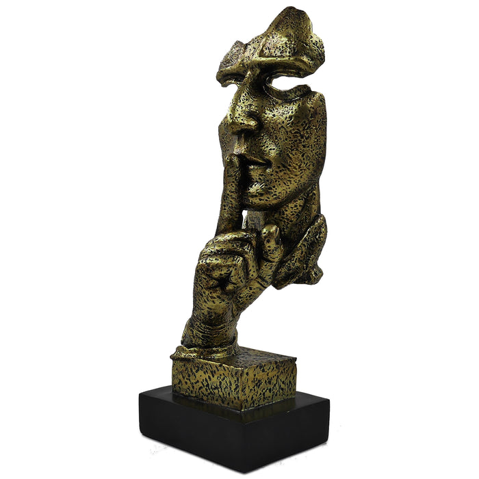 A bronze sculpture of a thinker's face, depicting a silent, reflective pose, placed on a black base.
