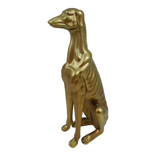 Gold greyhound dog statue on a white background.