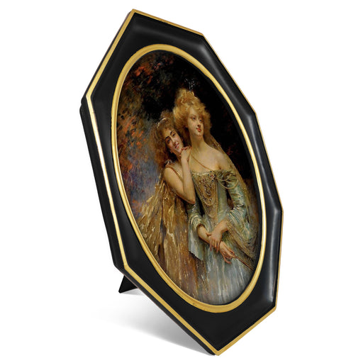 Octagon frame with oval opening in black and gold finish.