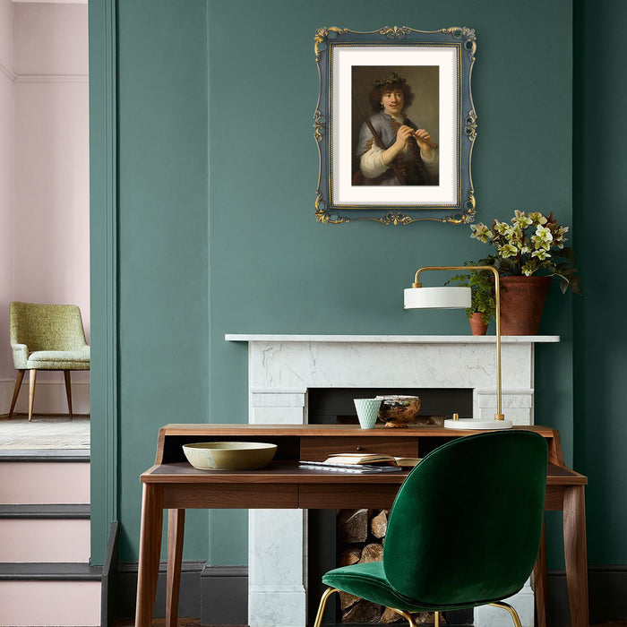 An 11x14-inch picture frame with a mat for an 8x10-inch photo, featuring sculpted edges and decorative accents in a hand-painted antique style finish.
