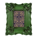 A vintage picture frame with hand-carved floral details in dark green, displayed around a portrait painting.