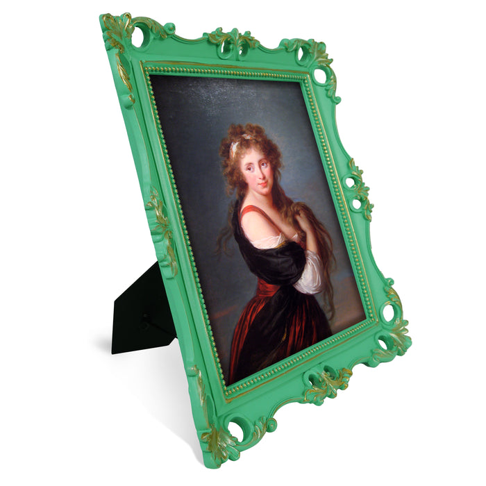 An ornate vintage-inspired picture frame with green edges and gold accents, designed for an 8x10-inch picture, featuring a decorative painting of a woman inside.