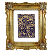 Antique bronze picture frame with a white mat, displayed with a picture of a vintage drawing.