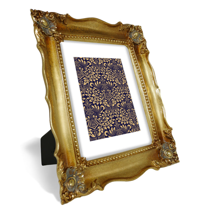An antique gold picture frame with a white mat, displayed portrait or landscape.