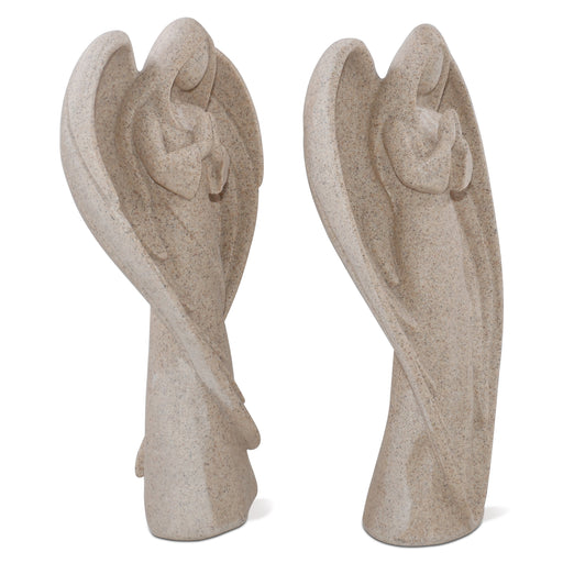 Two stone angel statues on a white background