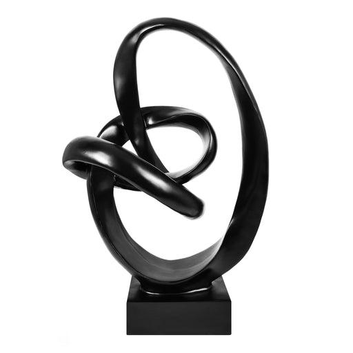 Black abstract sculpture on a white background.