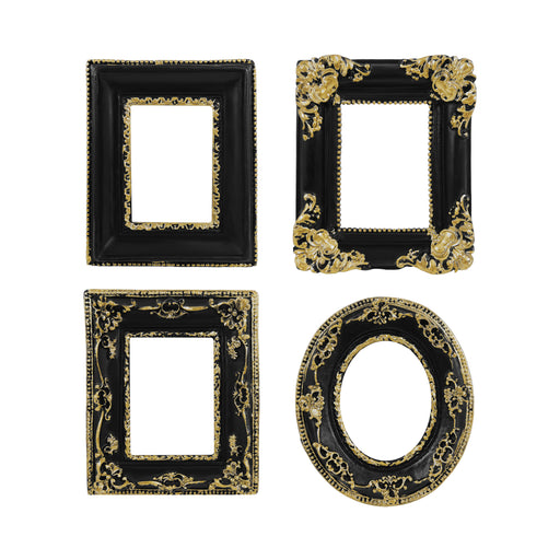 Set of four black picture frames with gold decorative elements on a white background