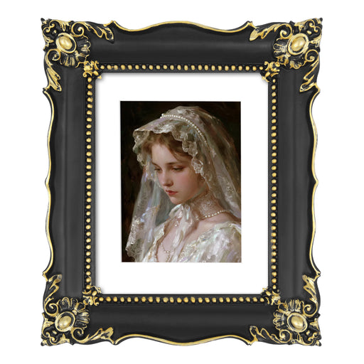 Black 8x10 baroque-style vintage picture frame with mat for 5x7 photos displayed in home décor setting
