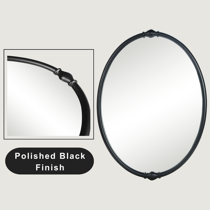 An oval-shaped mirror with a traditional frame in a bathroom setting, reflecting a modern shower stall and bathroom decor.