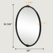 An oval-shaped mirror with a traditional frame in a bathroom setting, reflecting a modern shower stall and bathroom decor.