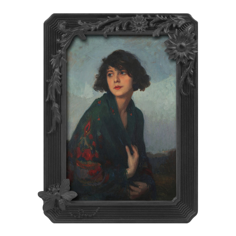 Black vintage 4x6 picture frame with hand-carved butterfly and flower border displayed in home décor setting