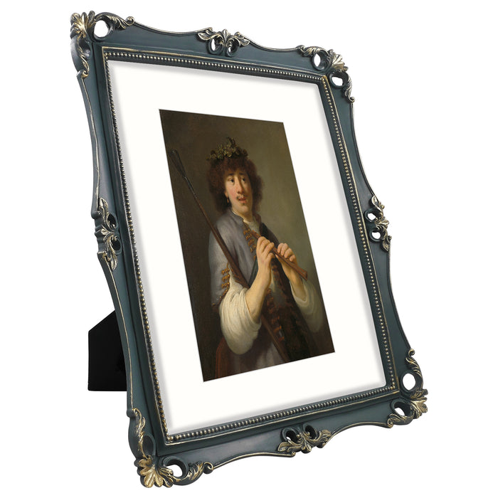 An 11x14-inch picture frame with a mat for an 8x10-inch photo, featuring sculpted edges and decorative accents in a hand-painted antique style finish.