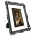 An 11x14-inch picture frame with a mat for an 8x10-inch photo, featuring sculpted edges and decorative accents in a hand-painted antique style finish.