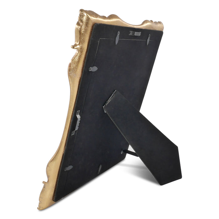 Bronze photo frame with detailing on a white background.