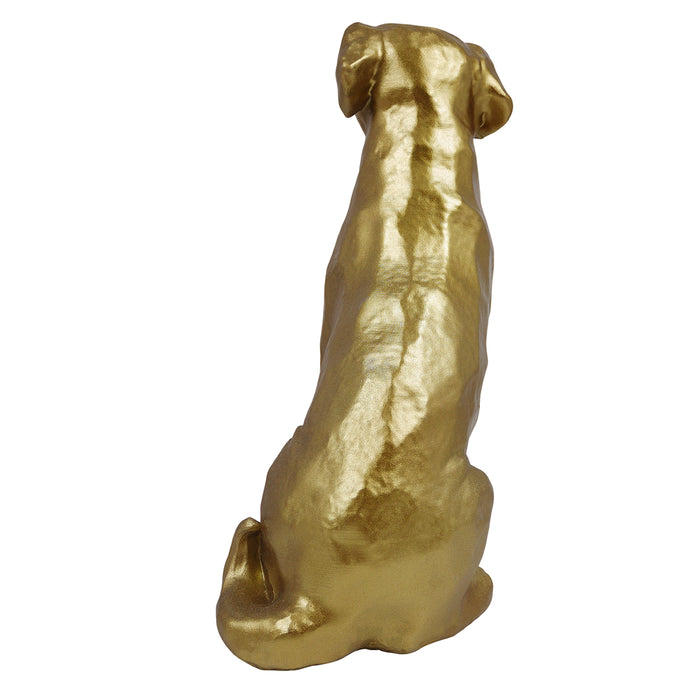 Gold dog figurine on a white background.