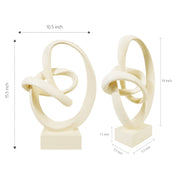 The abstract cream-colored sculptures are indicated with dimensions. 