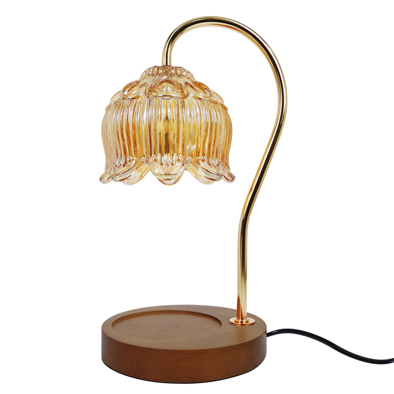 Table candle warmer lamp with floral design and wooden base.