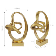 Gold abstract sculptures with dimensions indicated on a white background