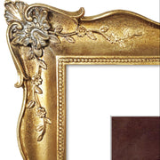 Decorative gold picture frame with intricate designs on a white background