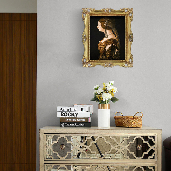 An ornate vintage-inspired gold picture frame, designed for an 8x10-inch picture, featuring a decorative painting of a woman inside.