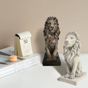 The lion sculpture is made from resin, with a bronzene finish that enhances its intricate textures. 
