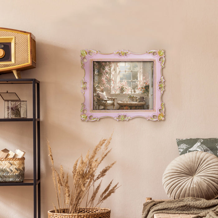 An ornate vintage-inspired picture frame with pink edges and gold accents, designed for an 8x10-inch picture, featuring a decorative painting.