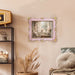 An ornate vintage-inspired picture frame with pink edges and gold accents, designed for an 8x10-inch picture, featuring a decorative painting.