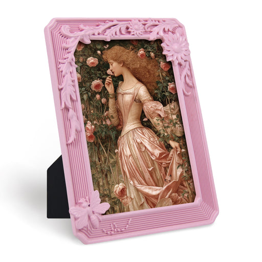 Pink decorative frame with a classical painting of a woman in a garden.