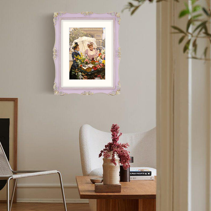 An 11x14-inch picture frame with a mat for an 8x10-inch photo, featuring sculpted edges and decorative accents in a hand-painted antique style finish.