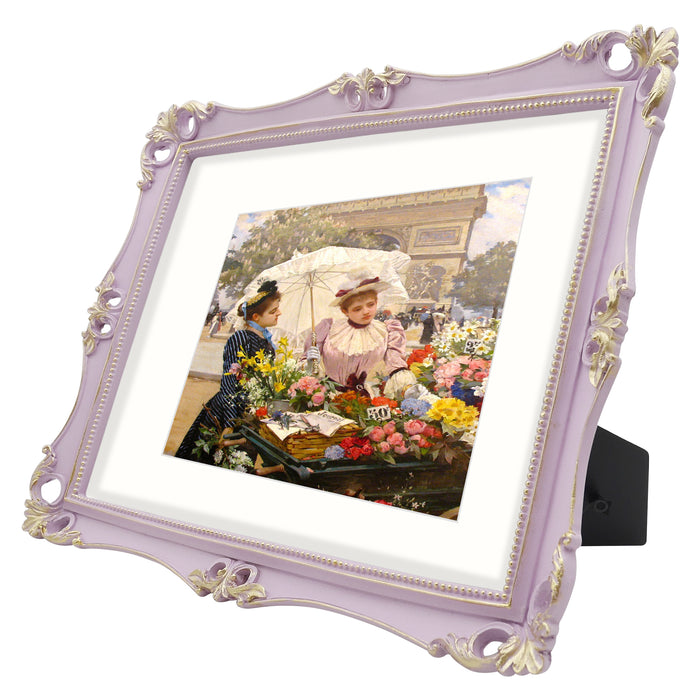 An 11x14-inch picture frame with a mat for an 8x10-inch photo, featuring sculpted edges and decorative accents in a hand-painted antique style finish.