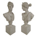Two stone Diana of Versailles busts on square plinths against a white background.