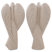 Pair of beige sandstone-look figurines on a white background