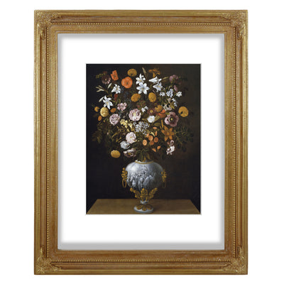 A vintage style picture frame with a floral design on the corners and a beaded border, displaying an 11x14 picture of a vase with flowers.