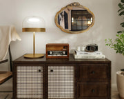 Napoleon Furniture sideboard with decorative mirror, lamp, and books in a room setting.