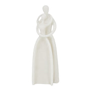 Flowing, faceless figures statue on white background