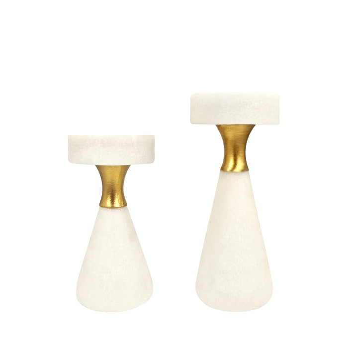 White pillar candle holders with sparkling accents for holiday decor
