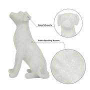 White dog figurine with detailed features on a white background.