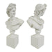 Two classical marble Apollo busts on square plinths against a white background.