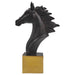 A dark brown horse sculpture standing on a solid golden base.