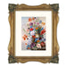 Gold picture frames featuring vintage-inspired floral carvings at each corner.